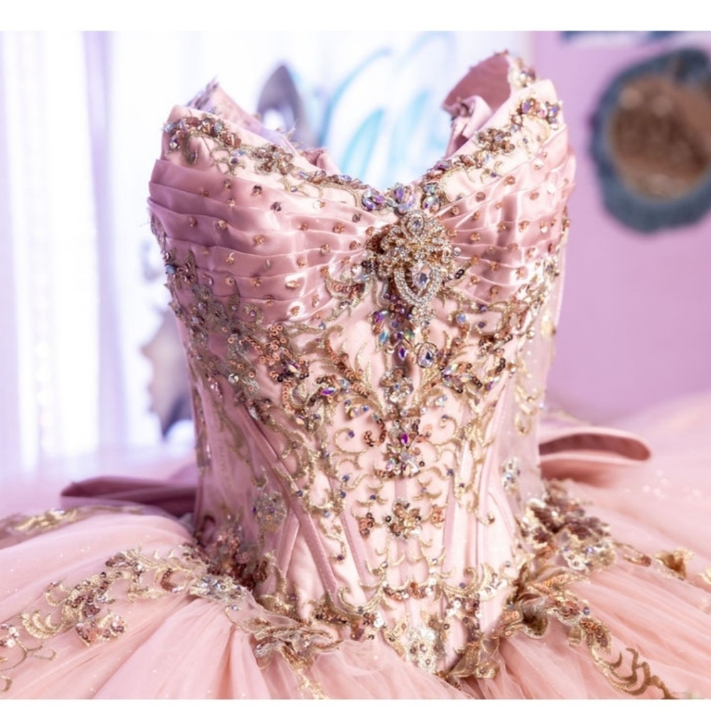 Elegant Pink Gown with Gold Embellishments
